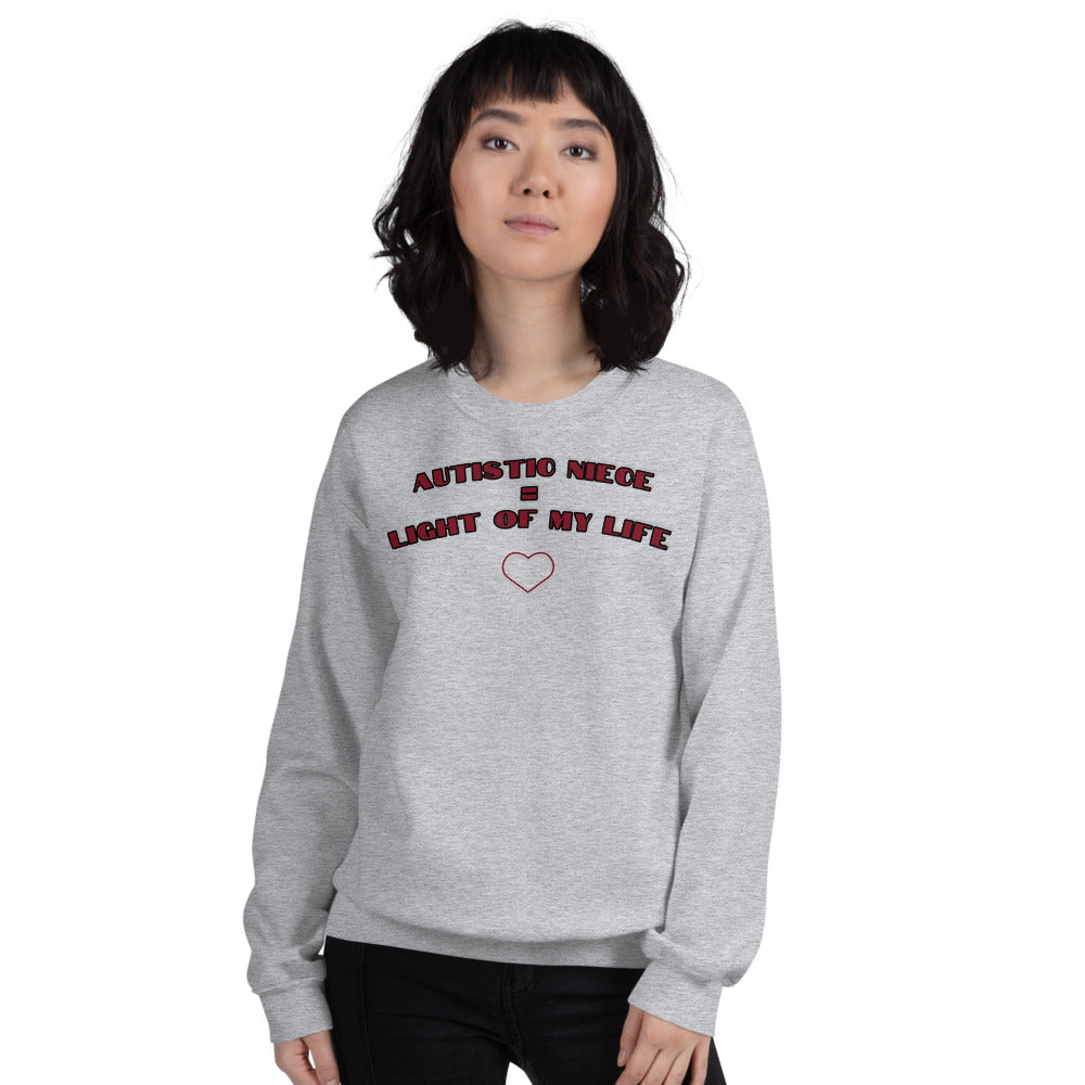 AUTISTIC NIECE = LIGHT OF MY LIFE | PREMIUM BELLA CANVAS LONG SLEEVE SWEATER